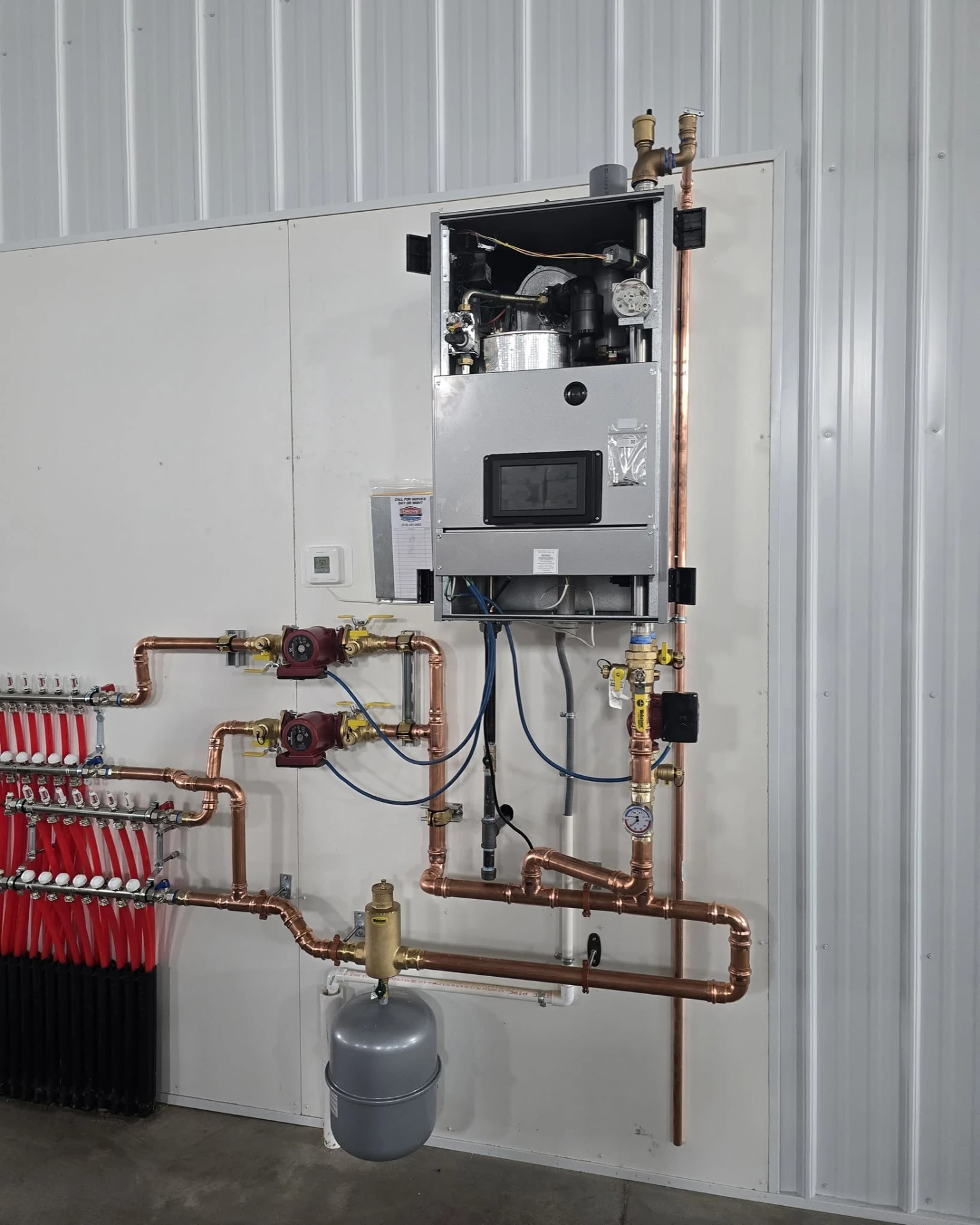 Grove Mechanical technician servicing a boiler
